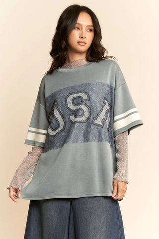 USA Lace Varsity Tee – Oversized Graphic T-Shirt with Sporty Stripe Sleeves